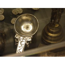 Hoxne Treasures, solar cross with wiggly tail on a spoon